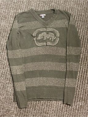Woman’s black Striped V-Neck Sweater with Embossed Logo